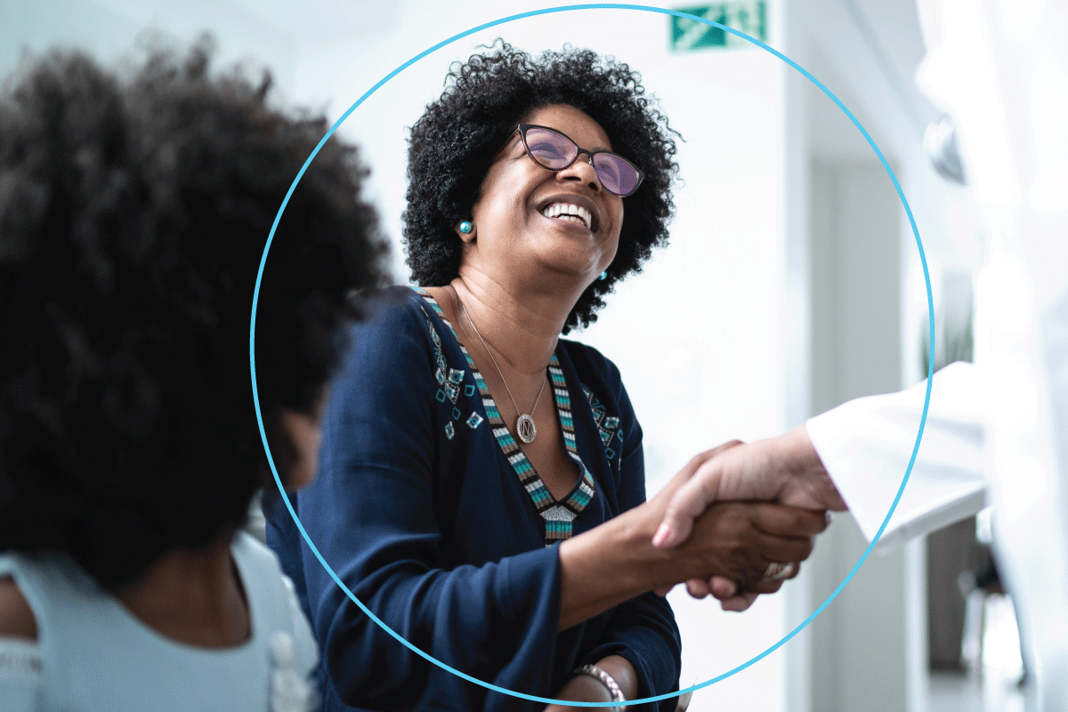 Labcorp branded of a patient shaking a provider's hand Labcorp branded of a patient shaking a provider's hand