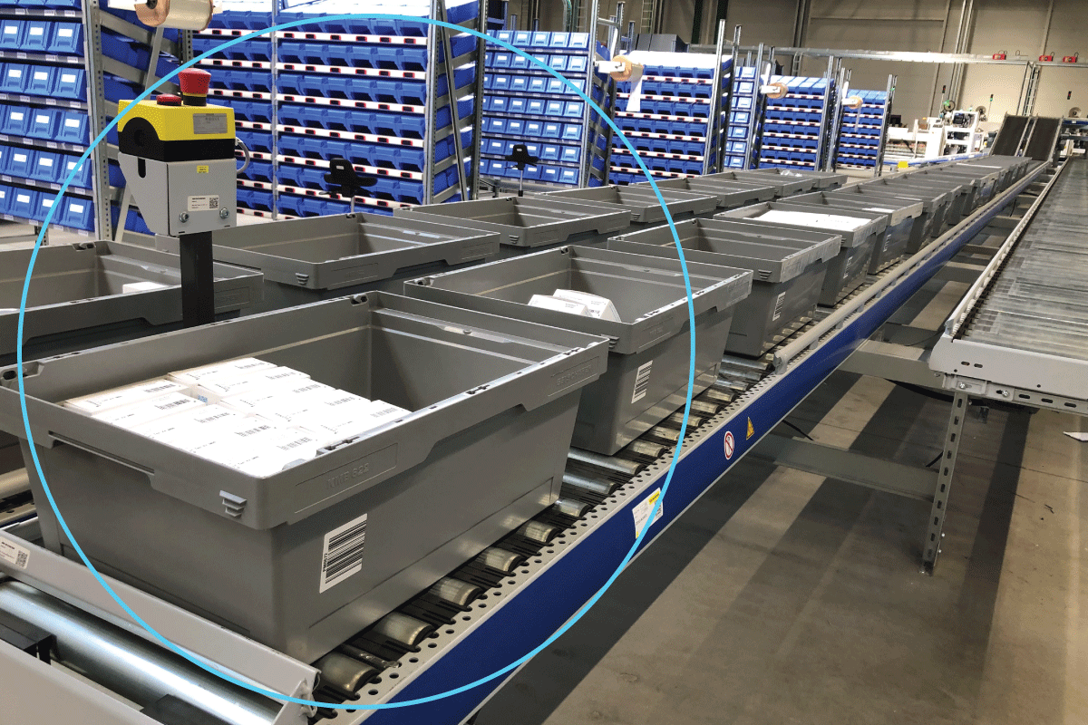 Labcorp branded image of bins in a facility Labcorp branded image of bins in a facility